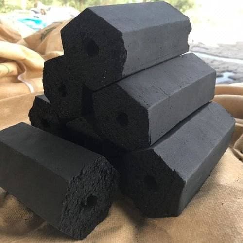Coconut shell charcoal-based hexagonal shaped briquettes
